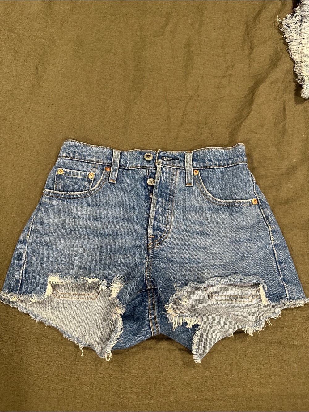 Levi's Distressed Light Blue Denim Cutoff Shorts